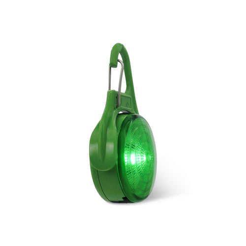 Green safety light with carabiner on a white background
